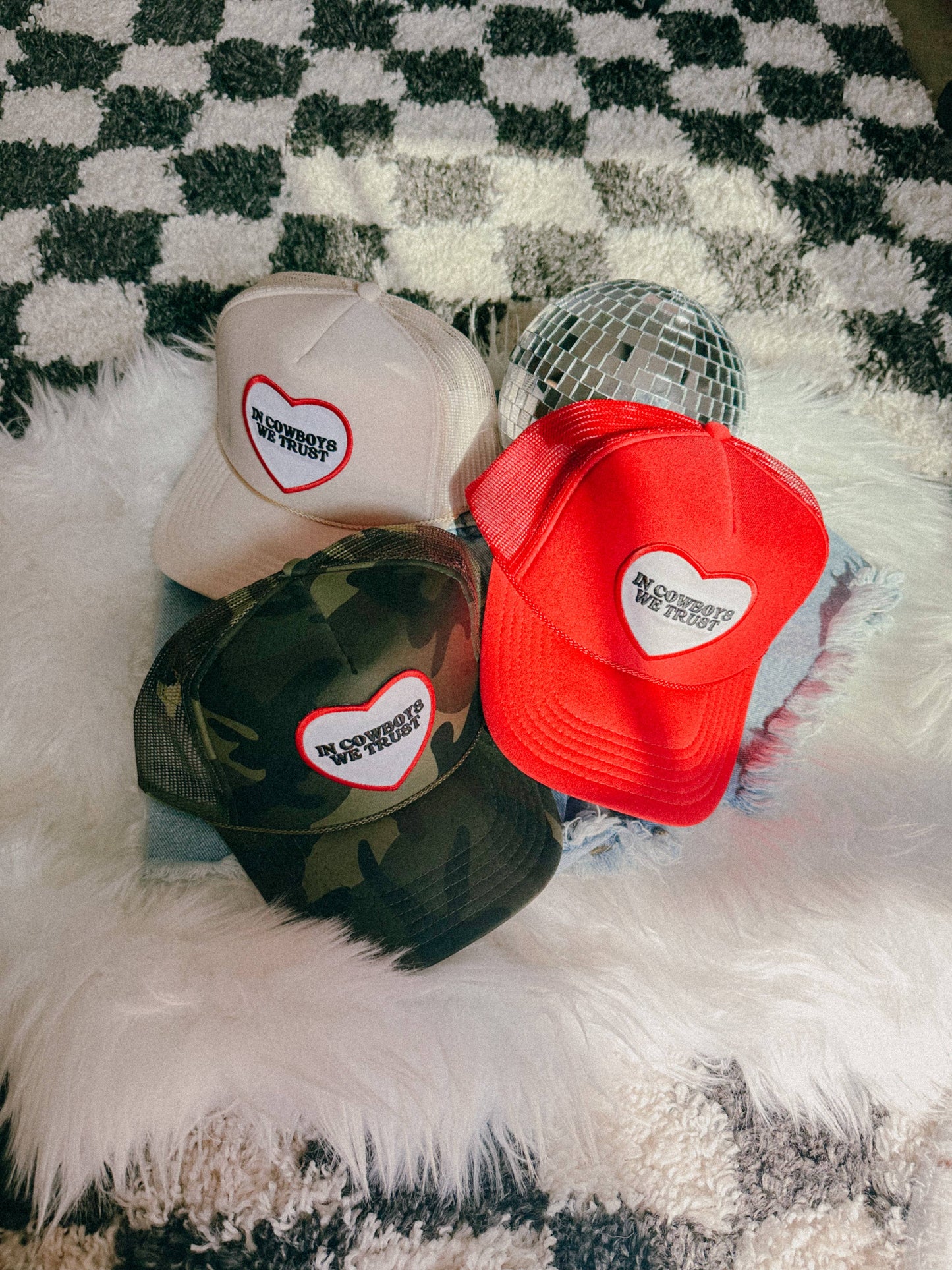 In Cowboys We Trust Patch Trucker Hat - Camo / Red